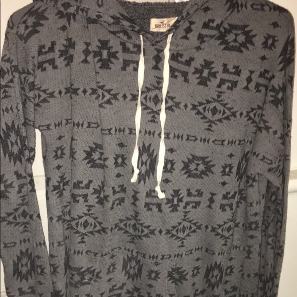 Light weight sweater with a hood